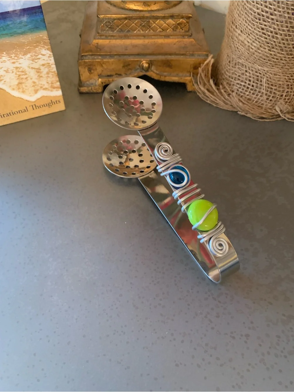Stainless Steel tea bag squeezer, wire with GREEN and BLUE stones.